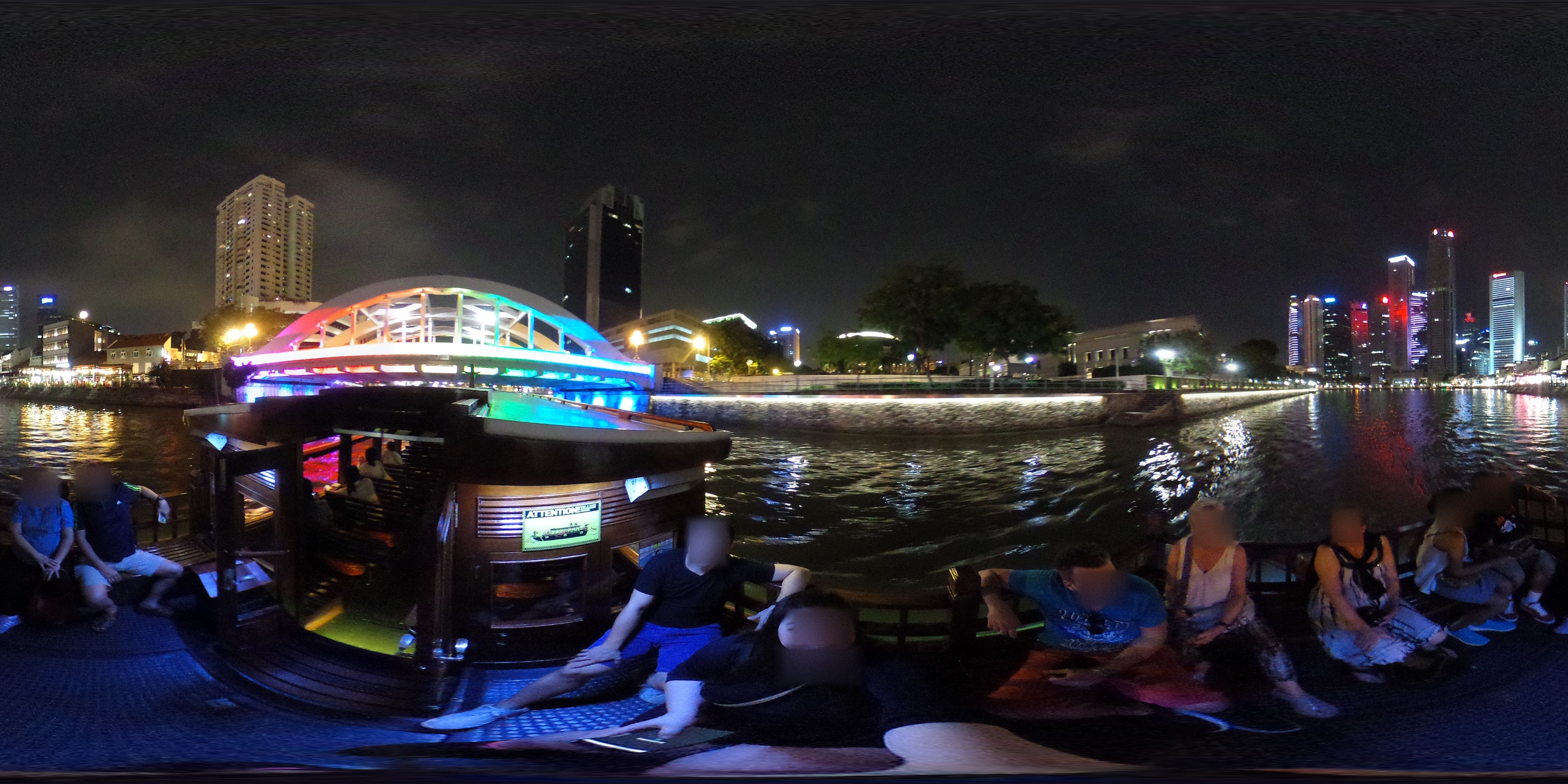 Colorful Night Waterfront Gathering