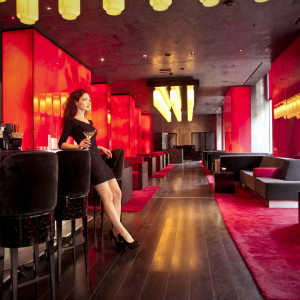 A lady relaxing in the luxury lounge of a hotel