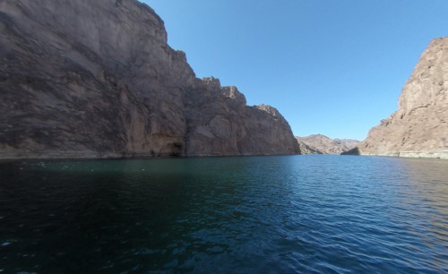 Las Vegas View of the clear waters of Emerald Cove in Arizona, surrounded by huge rock formations