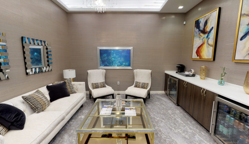 undefined Medical center offering infusion therapy with private treatment rooms in Las Vegas - PharmaScript Ambulatory Infusion Center's receiving area with elegantly designed interior