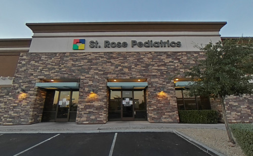 undefined St. Rose Pediatrics' front view of the building with bricked posts & mirrored glass doors - pediatrician in Henderson, Nevada