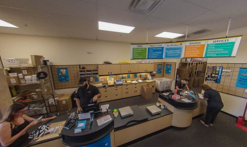 undefined Busy staffs assisting customers in packaging, shipping and mailing services in The UPS Store - Blue Diamond, Las Vegas