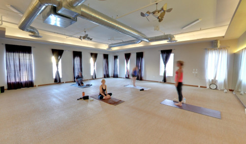 Few participants of a yoga class being held in TruFusion yoga studio & fitness center in Las Vegas