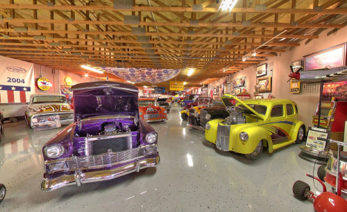 Several vintage cars in different make & model parked inside Nostalgia Street Rods museum, just off the Las Vegas strip.
