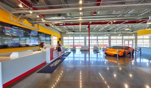 Speedvegas -  a car racing track in Las Vegas, with its front desk & a model display of an exotic car in it's lobby
