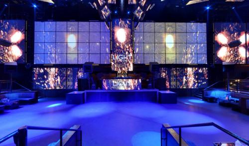DJ stage in the dancing hall with giant video walls in The LIGHT Vegas nightclub
