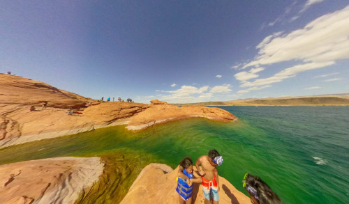 Las Vegas Tourists getting ready for a cliff diving activity in Sand Hollow State Park's beach in Utah