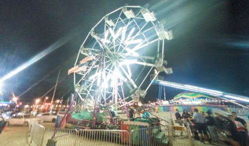 Huge ferris wheel ride in a carnival set up during the Rainbow Fall Festival in Las Vegas